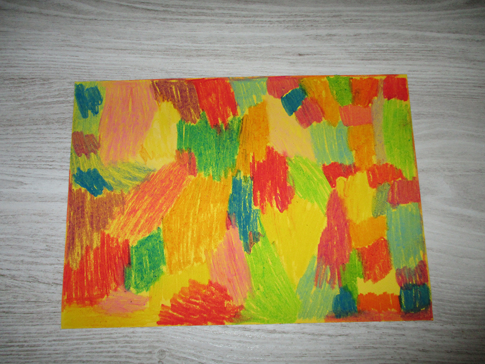 Kartka A4 z kolorowymi plamami.