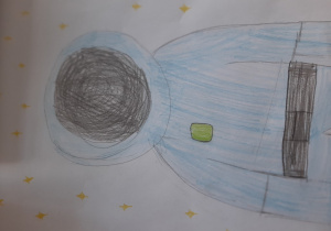 Astronauta w niebieskim stroju. Praca wykonana w gr. I pod opieką Pani P. Filipczak.