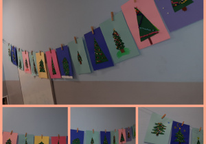 Wycinankowe choinki powieszone na sznurku na ścianie. Prace wykonane pod opieką Pani P. Filipczak.