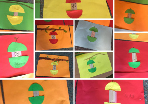 Prace uczniów klasy 2a. Na kolorowych kartkach znajdują się „ogryzki jabłek” wykonane z drewnianych patyczków i kolorowych kartek.