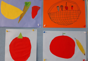 Owoce i warzywa z kolorowego papieru przedstawione na tablicy korkowej. Zdjęcie w zbliżeniu.