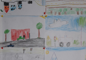 Rysunki uczniów przedstawiające ruch uliczny.