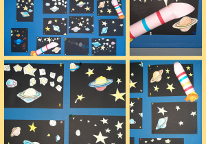 Galeria prac uczniów przedstawiająca kosmos. Na czarnym kartonie naklejone są gwiazdy, planety oraz rakiety.