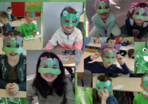Zdjęcie przedstawia uczniów klasy Ic. Dzieci mają na twarzach maski żabek.