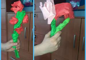 Kwiaty w formie 3D wykonane z kolorowego papieru. Zielone łodygi i kwiaty w kolorze czerwonym i różowym. Prace wykonane w gr. I przez uczniów kl. I i II.