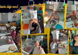 Uczniowie siedzą wspólnie przy złączonych stolikach. Na głowach mają papierowe czapki kucharskie. Przygotowują i konsumują przygotowany posiłek.