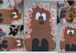 Uczniowie wykonują pracę pt. ,,Jeż”. Każdy uczeń maluje brązową farbą swoją dłoń, następnie odciska ją na kartonie tworząc kolce jeża.